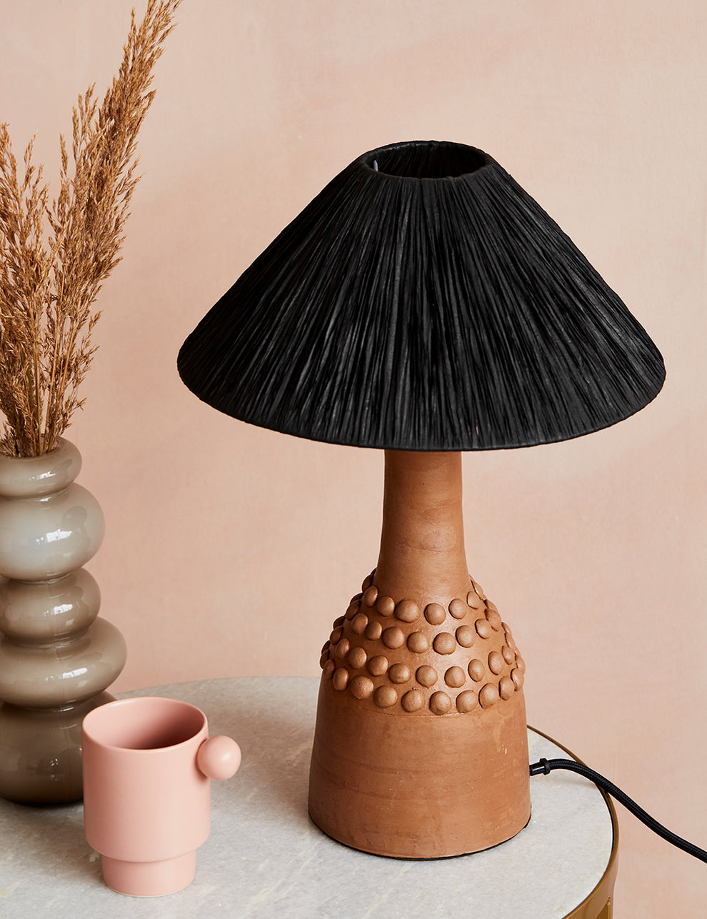 Tan Bobbled Terracotta Table Lamp with Black Raffia Shade
