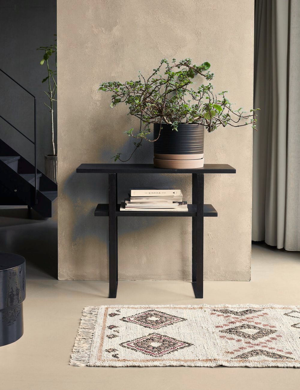 Woda Black Console Table in a room setting