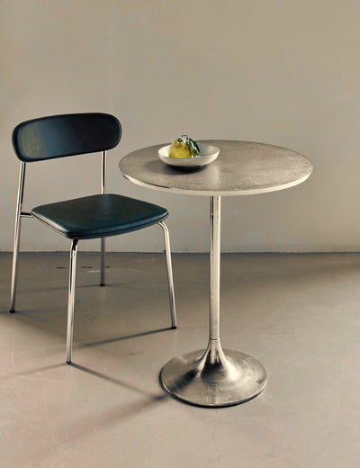 Pan Silver Finish Cafe Table in a room setting