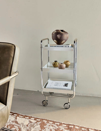 Roll Off-white & Chrome Trolley in a room setting