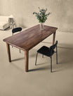 Balance Antique Brown Dining Table in a room setting