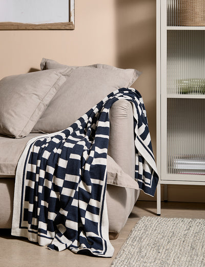 Ludo knitted throw in Dark Ink