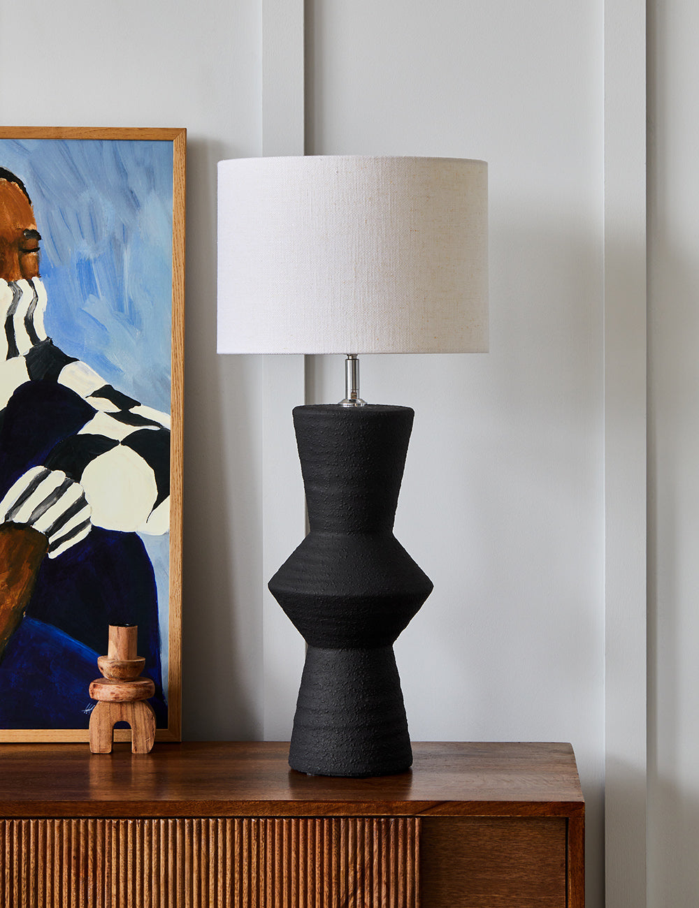 Black lamp base with shop white shade