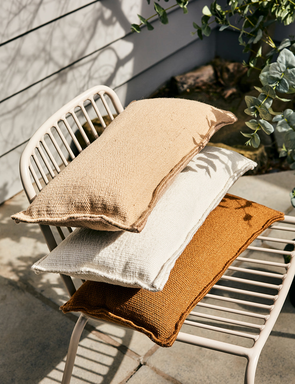 White outdoor shop cushions
