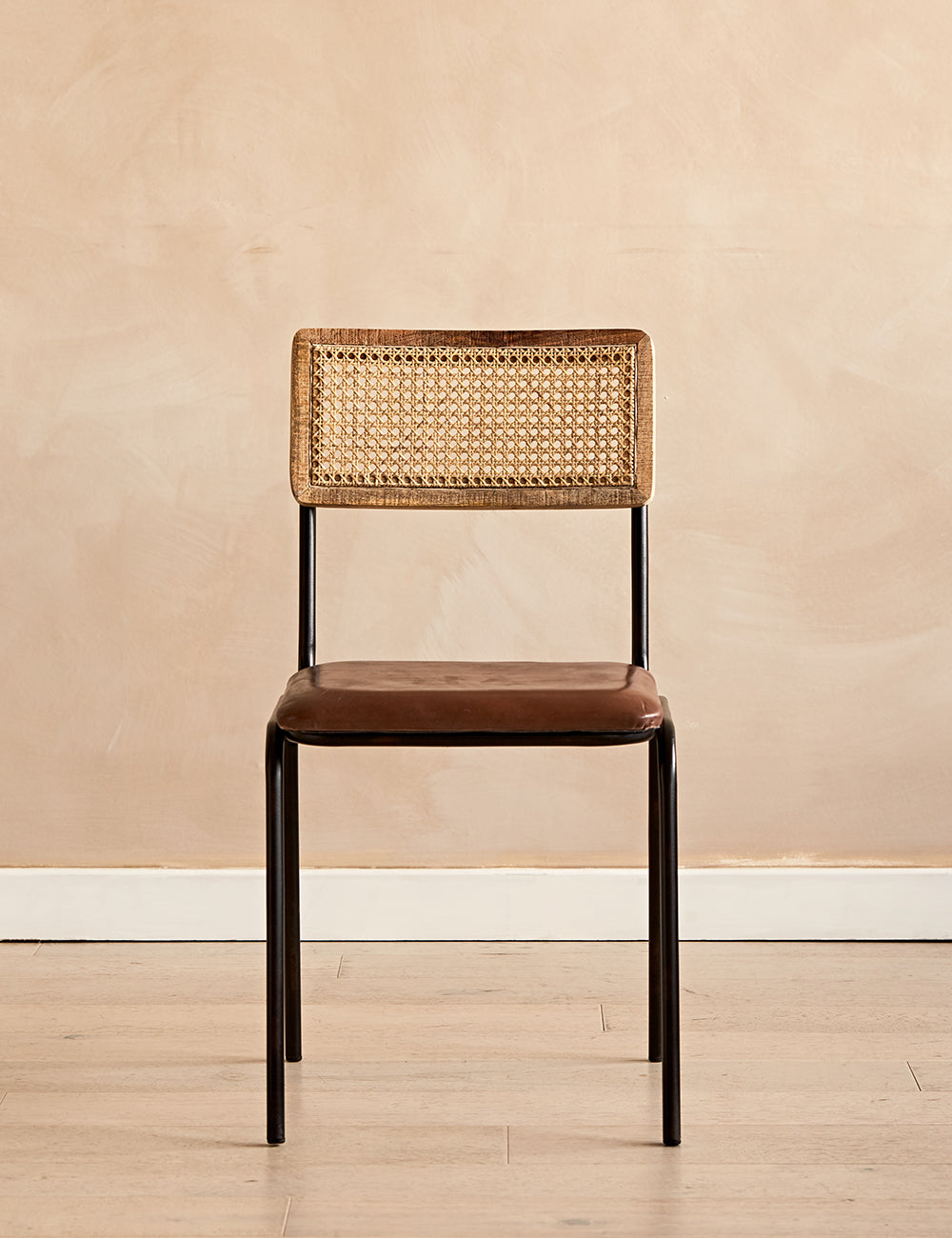 Cane and leather shop chair