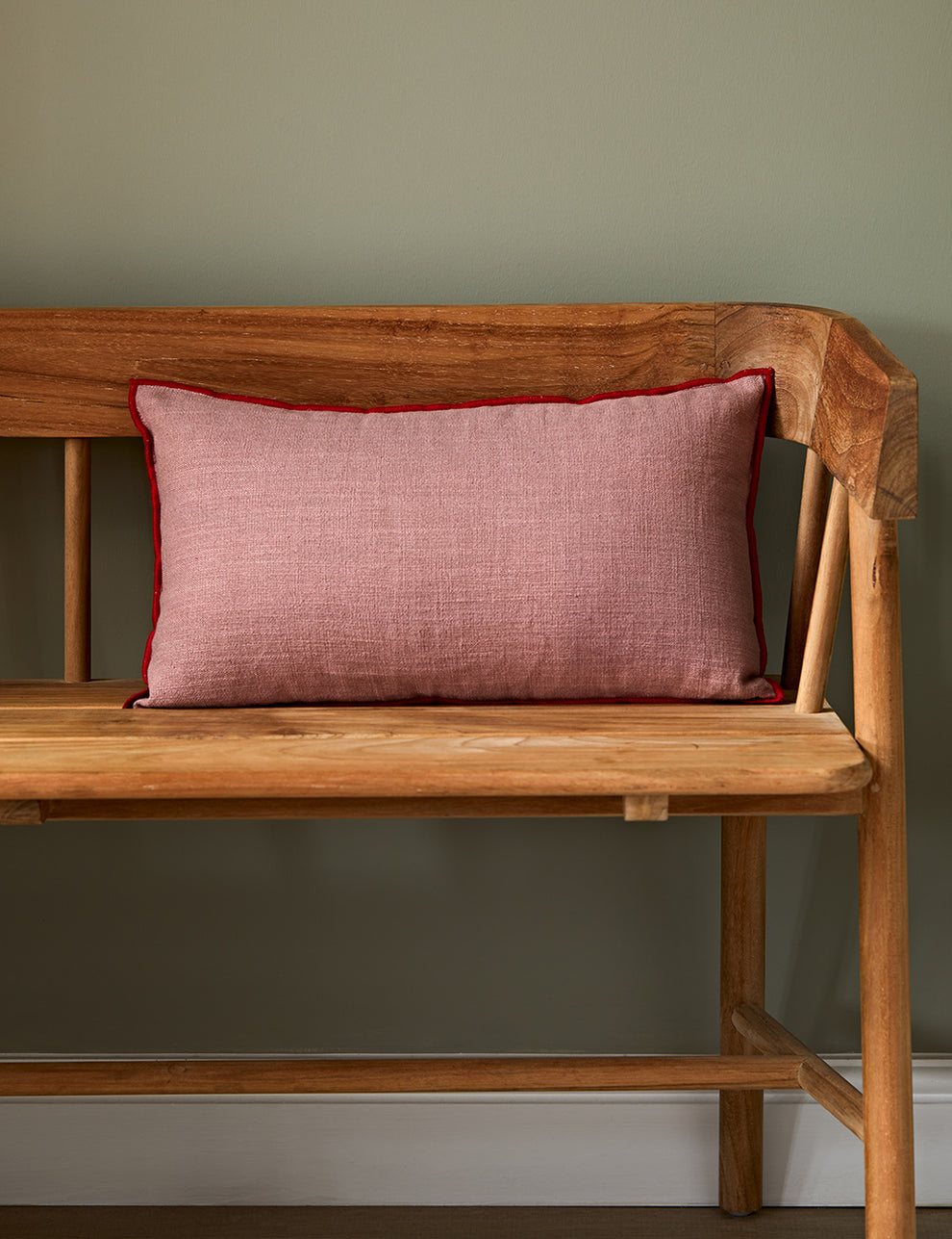 Pink Cushion with Contrast Red Trim