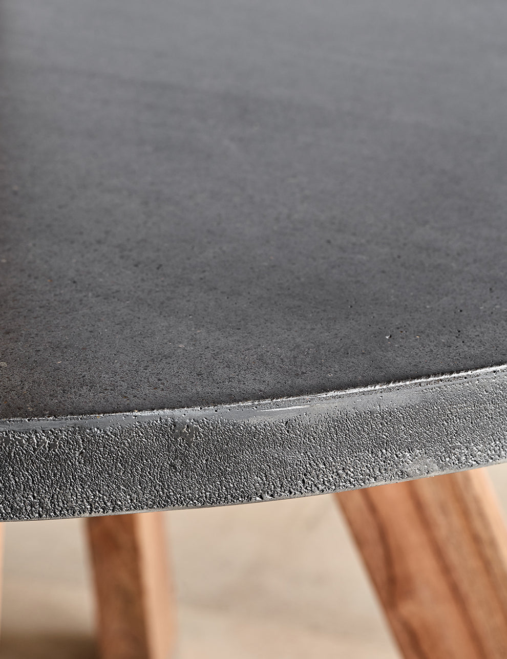 Round Trondheim Cement & Mindi Wood Dining Table Top Detail