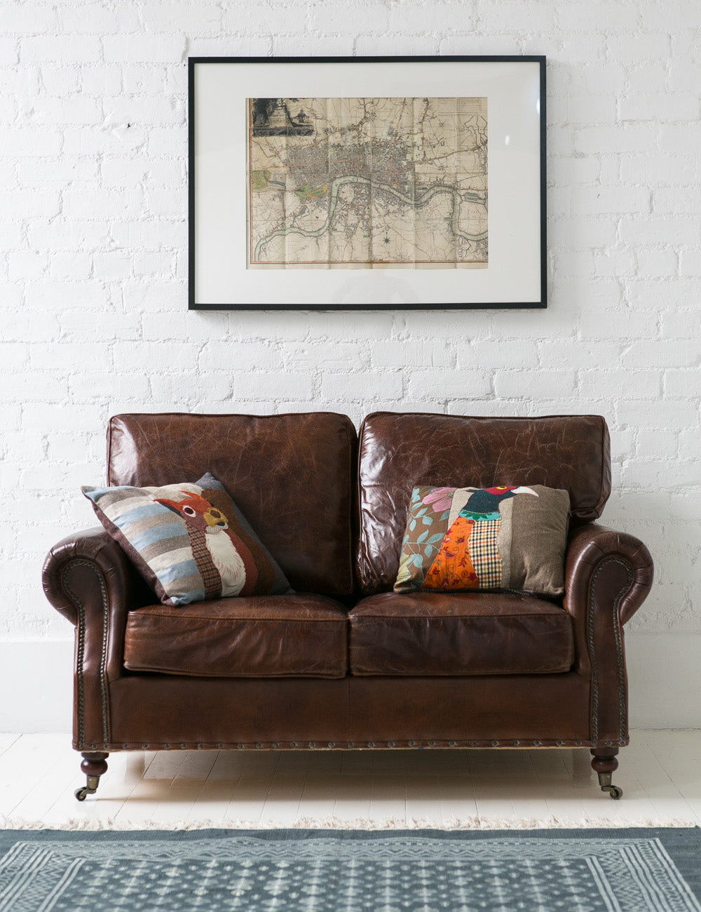 Leather love on sale sofa
