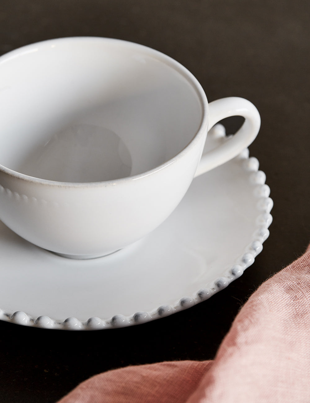 White Pearl Stoneware Cup and Saucer Detail